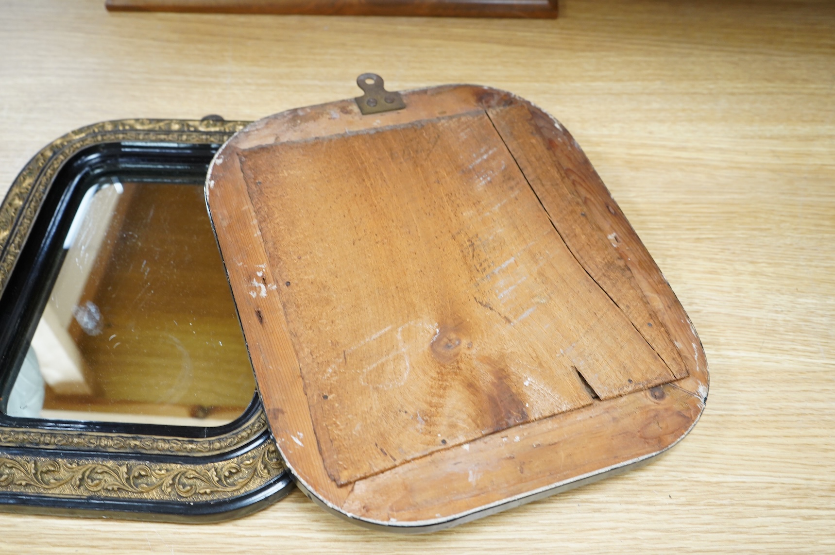 A pair of 19th century French ebonised and gilt wall mirrors, 32 x 27cm